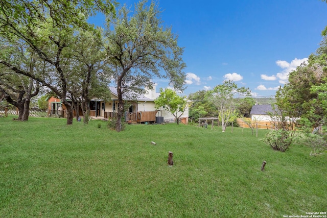 view of yard with fence
