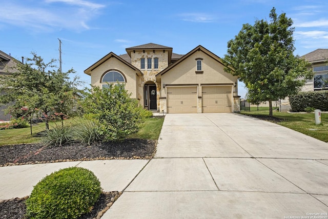 104 Talavera, Boerne, TX 78006 - view of front of home featuring stone siding, stucco siding, concrete driveway, and a garage