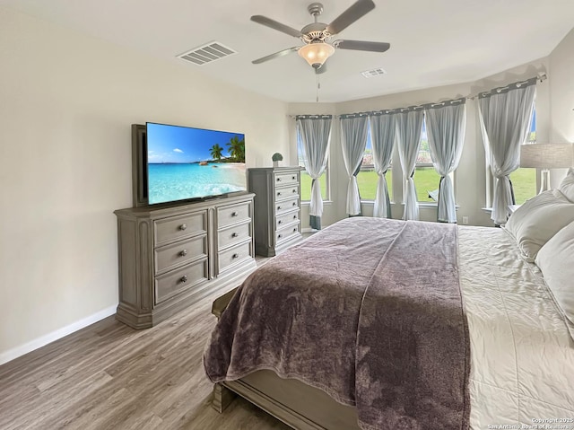 104 Talavera, Boerne, TX 78006 - bedroom featuring wood finished floors, baseboards, and a ceiling fan