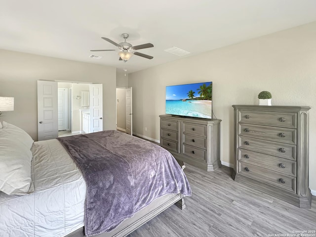 104 Talavera, Boerne, TX 78006 - bedroom featuring baseboards, light wood-type flooring, and ceiling fan