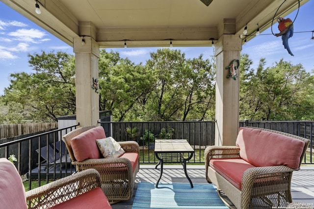 wooden deck featuring fence