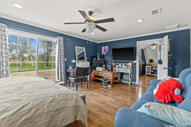 6377 County Road 659, Brazoria, TX 77422 - bedroom featuring crown molding, visible vents, wood finished floors, access to exterior, and a ceiling fan