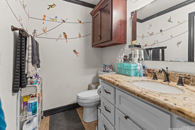 6377 County Road 659, Brazoria, TX 77422 - bathroom featuring vanity, baseboards, and toilet