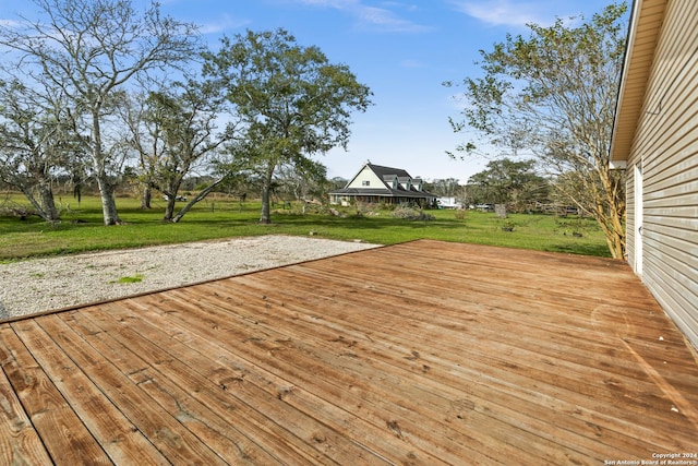 6377 County Road 659, Brazoria, TX 77422 - wooden deck with a lawn