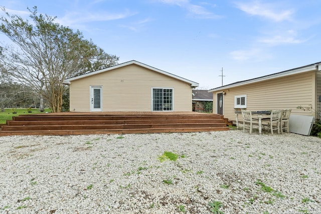 6377 County Road 659, Brazoria, TX 77422 - rear view of property with a wooden deck