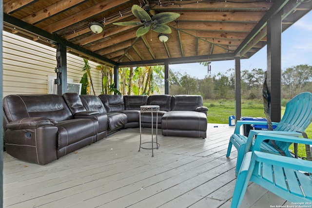 6377 County Road 659, Brazoria, TX 77422 - wooden deck with a ceiling fan and outdoor lounge area