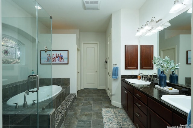 213 Heavens Way, San Antonio, TX 78260 - full bathroom featuring visible vents, a sink, a bath, and stone finish floor