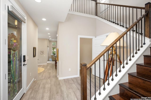 440 E Olmos, San Antonio, TX 78212 - staircase with wood finished floors, recessed lighting, and baseboards