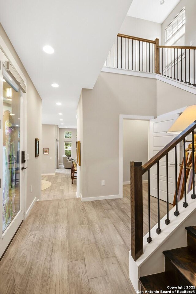 440 E Olmos, San Antonio, TX 78212 - stairway with wood finished floors, recessed lighting, and baseboards