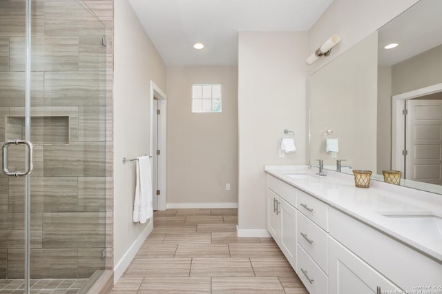 440 E Olmos, San Antonio, TX 78212 - full bathroom featuring a shower stall, baseboards, double vanity, and recessed lighting