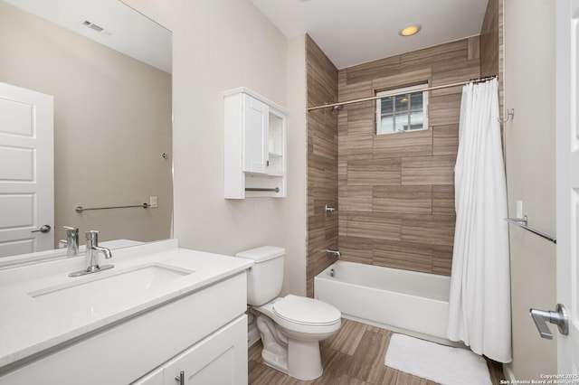 440 E Olmos, San Antonio, TX 78212 - full bathroom with toilet, vanity, shower / bath combo with shower curtain, wood finished floors, and recessed lighting