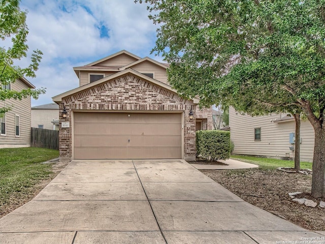 traditional-style home with brick siding, a garage, fence, and concrete driveway