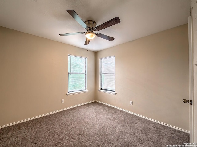 unfurnished room featuring carpet flooring, ceiling fan, and baseboards