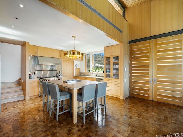 dining space featuring stairs, recessed lighting, and an inviting chandelier