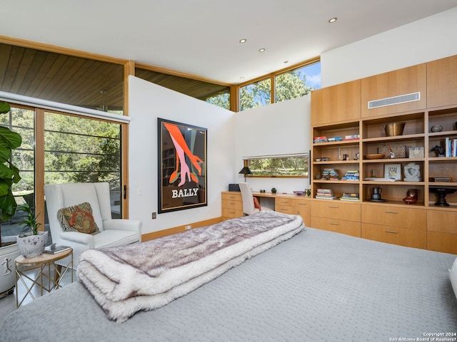bedroom featuring access to outside and recessed lighting