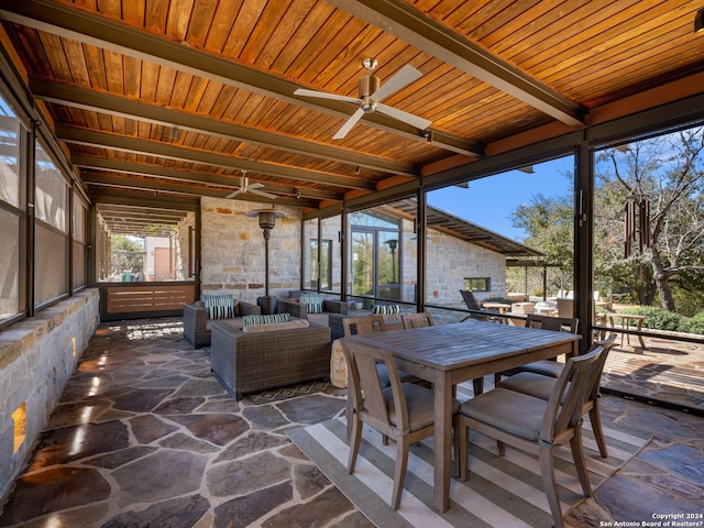 view of patio with ceiling fan, outdoor dining area, and an outdoor hangout area