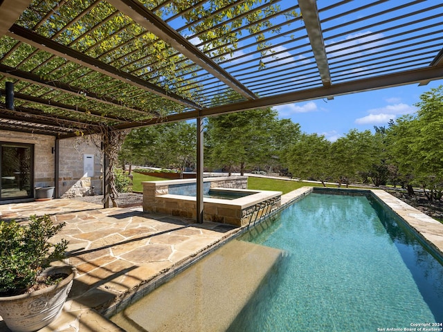 pool with a pergola, an in ground hot tub, and a patio area