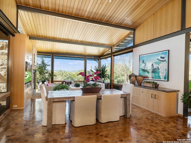 sunroom / solarium with a wall of windows