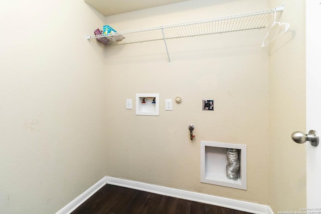 407 Wind Gust, New Braunfels, TX 78130 - laundry area with gas dryer hookup, baseboards, dark wood finished floors, hookup for a washing machine, and hookup for an electric dryer