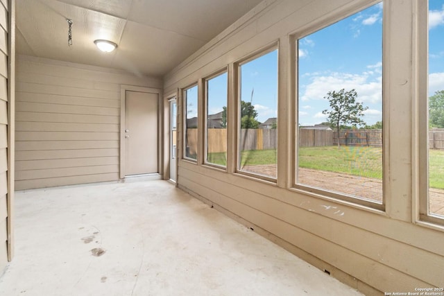 407 Wind Gust, New Braunfels, TX 78130 - unfurnished sunroom featuring concrete flooring