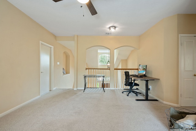 office area featuring baseboards, carpet, a ceiling fan, and visible vents