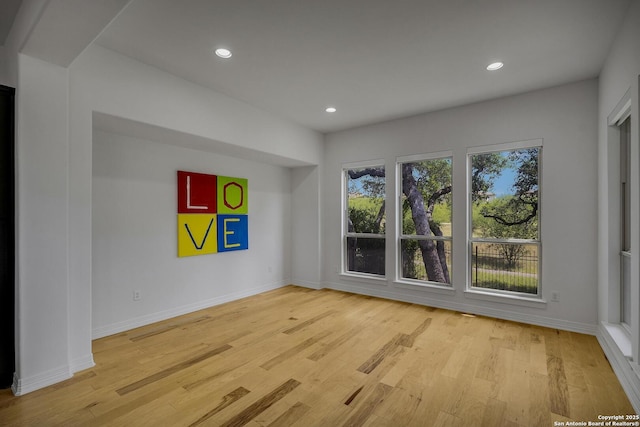 22932 Estacado, San Antonio, TX 78261 - spare room featuring wood finished floors, recessed lighting, and baseboards