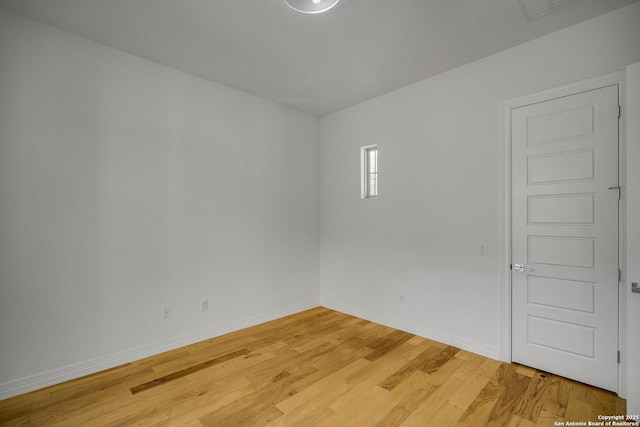 22932 Estacado, San Antonio, TX 78261 - spare room featuring baseboards and light wood-style floors