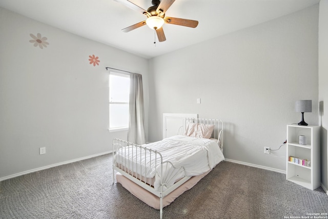 bedroom featuring carpet floors, a ceiling fan, and baseboards