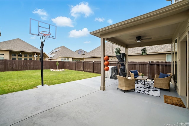 view of patio with a ceiling fan and a fenced backyard