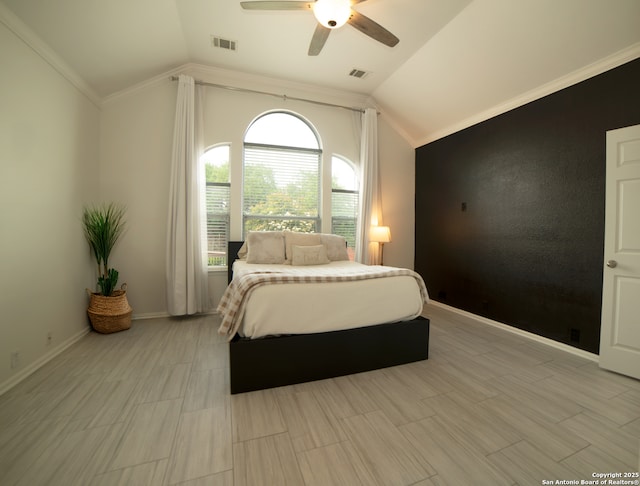bedroom with visible vents, ornamental molding, and lofted ceiling