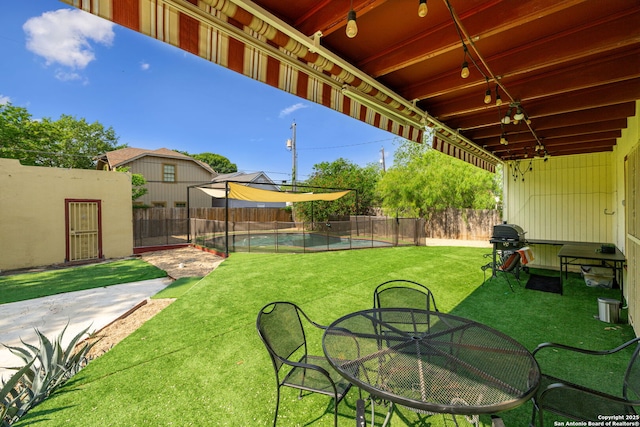 view of yard featuring a fenced backyard and a fenced in pool