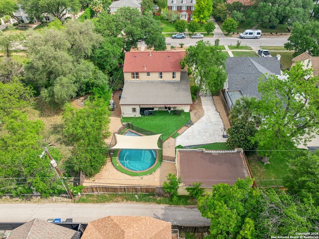 birds eye view of property with a residential view
