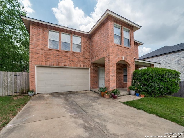 traditional home featuring concrete driveway, brick siding, fence, and a garage