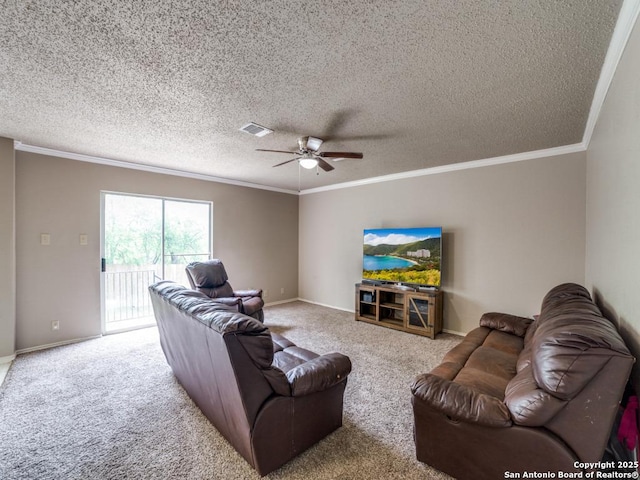 living area with visible vents, a ceiling fan, and ornamental molding