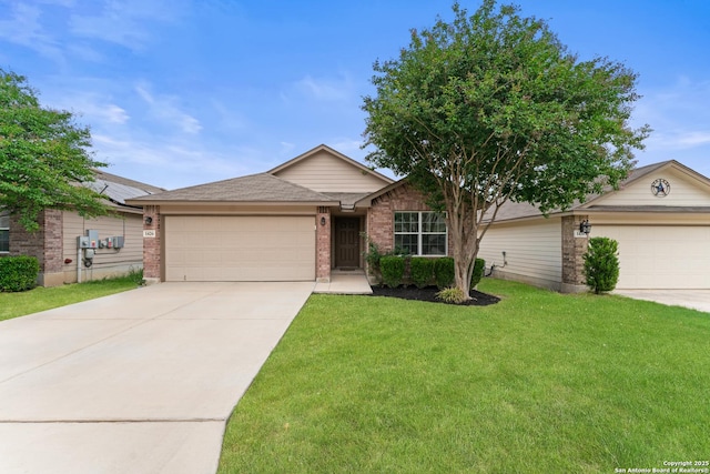 ranch-style home featuring brick siding, a garage, a front yard, and concrete driveway