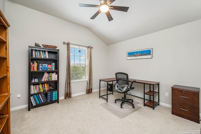 home office featuring carpet floors, ceiling fan, baseboards, and vaulted ceiling
