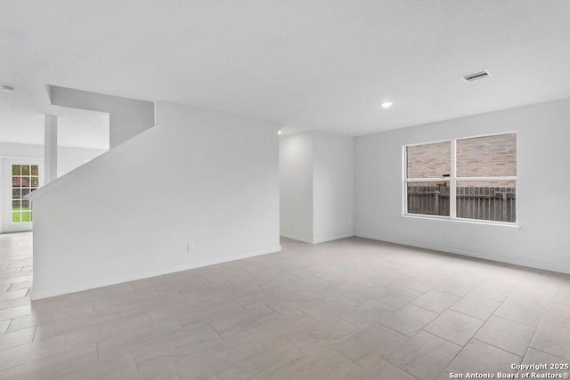 11202 Forest Pass, Live Oak, TX 78233 - unfurnished room featuring recessed lighting, baseboards, visible vents, and stairway