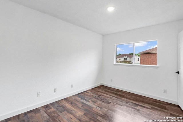11202 Forest Pass, Live Oak, TX 78233 - spare room featuring recessed lighting, baseboards, and wood finished floors