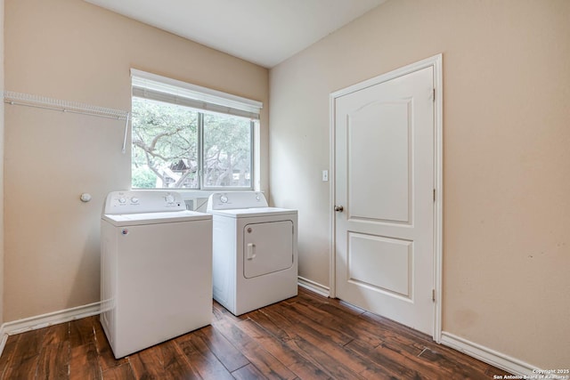 laundry room featuring washer and dryer, laundry area, baseboards, and dark wood-type flooring