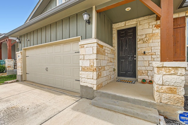 entrance to property featuring board and batten siding and stone siding