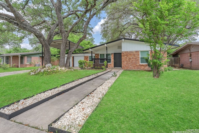 mid-century inspired home featuring fence, a garage, a front lawn, and brick siding