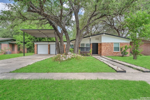 mid-century modern home featuring concrete driveway, a front yard, and brick siding