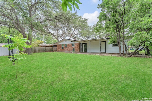 view of yard with fence