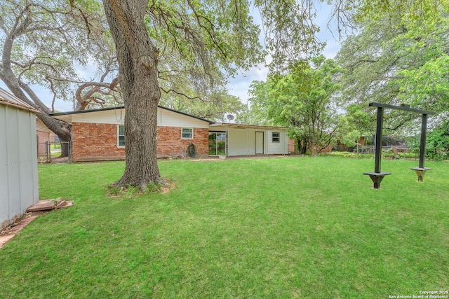 view of yard with fence