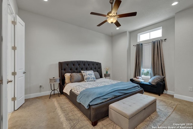 bedroom with baseboards, light carpet, a ceiling fan, and recessed lighting