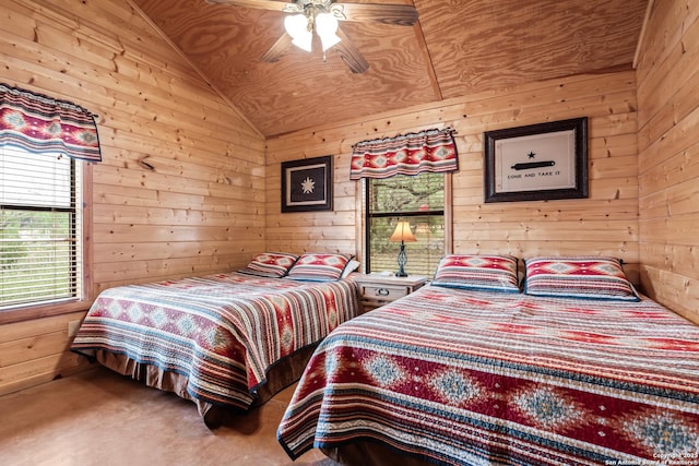 bedroom featuring a ceiling fan, lofted ceiling, and wooden walls