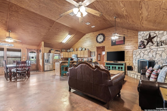 living room with wooden walls, ceiling fan, vaulted ceiling, and wood ceiling