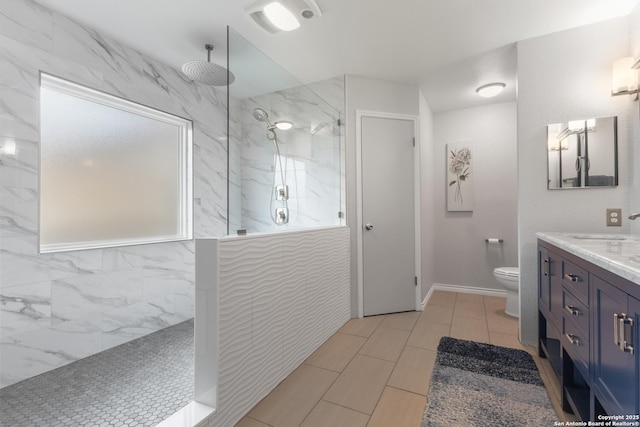 1901 Creek Mtn, San Antonio, TX 78259 - full bathroom featuring a marble finish shower, baseboards, vanity, and toilet