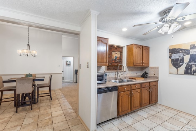1901 Creek Mtn, San Antonio, TX 78259 - kitchen with brown cabinets, a sink, ceiling fan with notable chandelier, a toaster, and stainless steel dishwasher