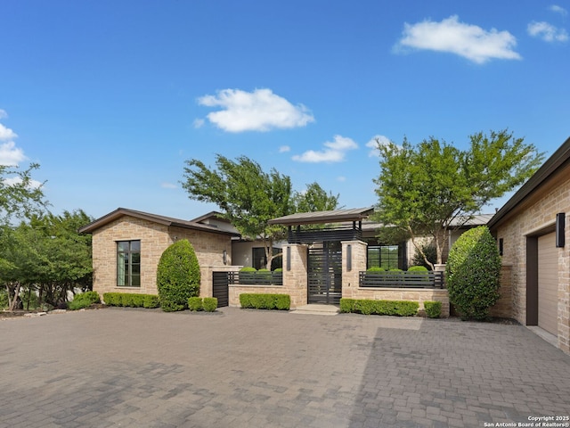 4701 Peralta Ln, Austin, TX 78735 - view of front of property featuring a gate, fence, and stone siding